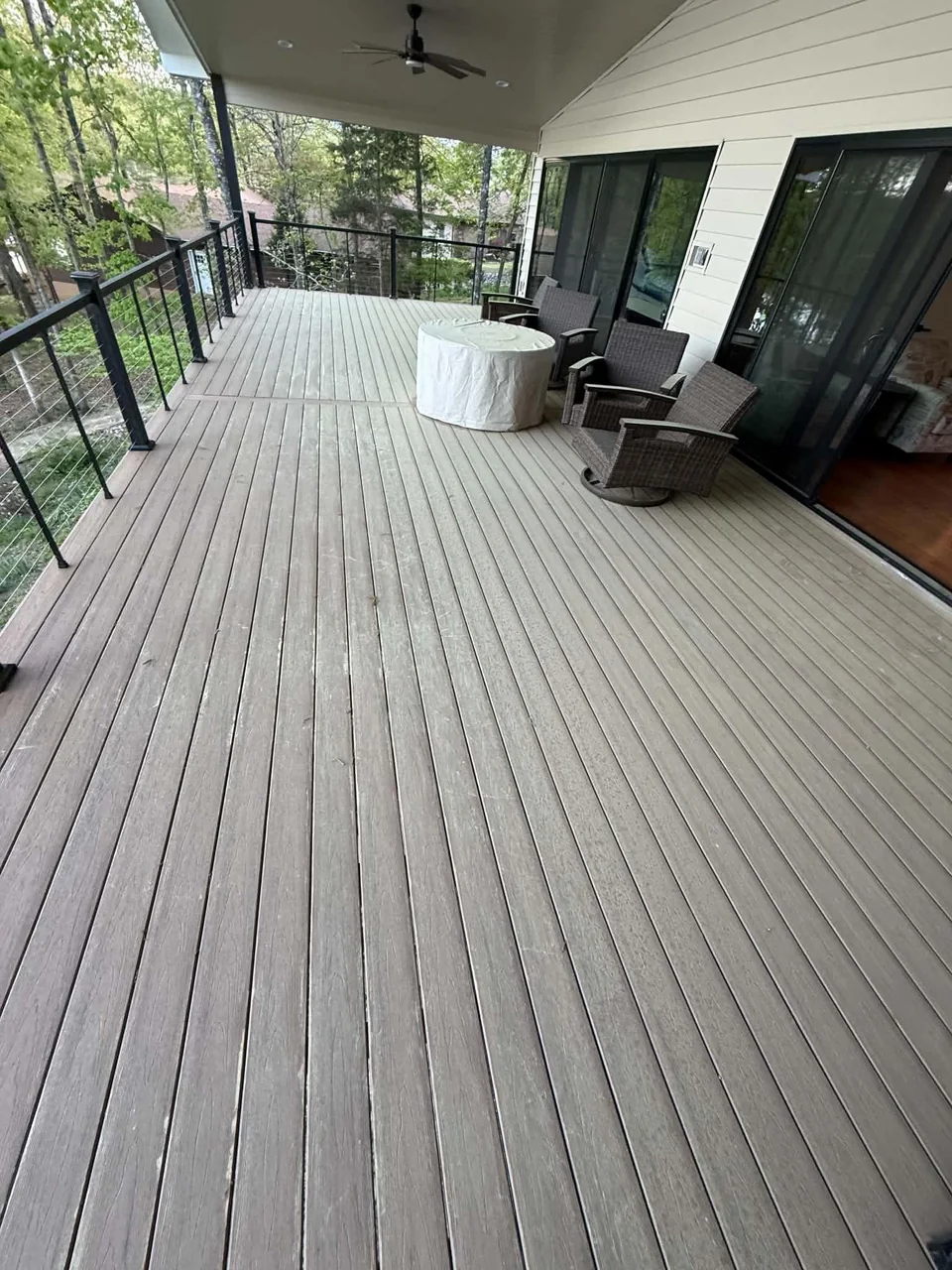Completed deck at Empinado Way with black railing